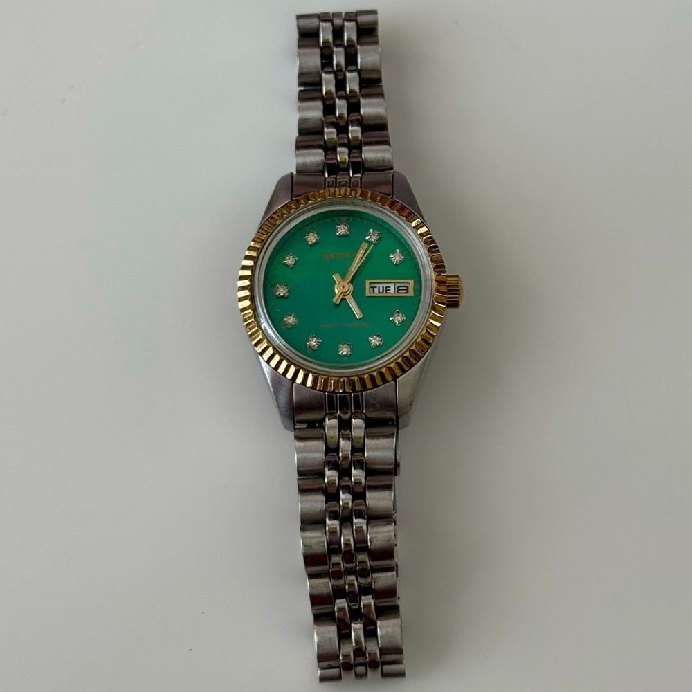 Armitron Women's Silver and Gold Watch with Green Dial